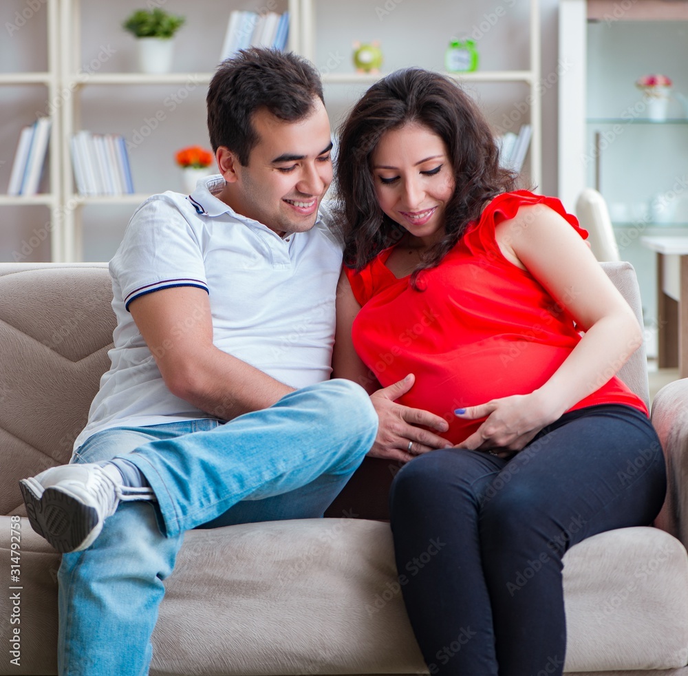 Young couple family expecting a baby Young couple family expecting a baby
