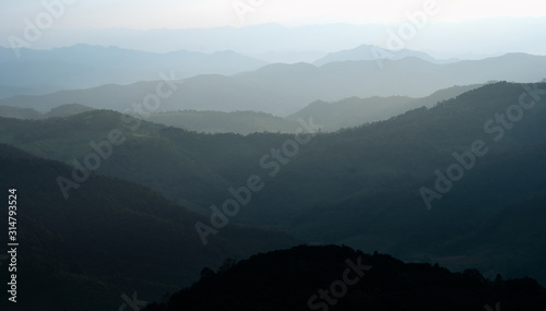 Ariel view of landscape mountain rain forest layer with fog in the morning.