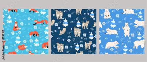 Set of seamless patterns with winter animals. Vector graphics.