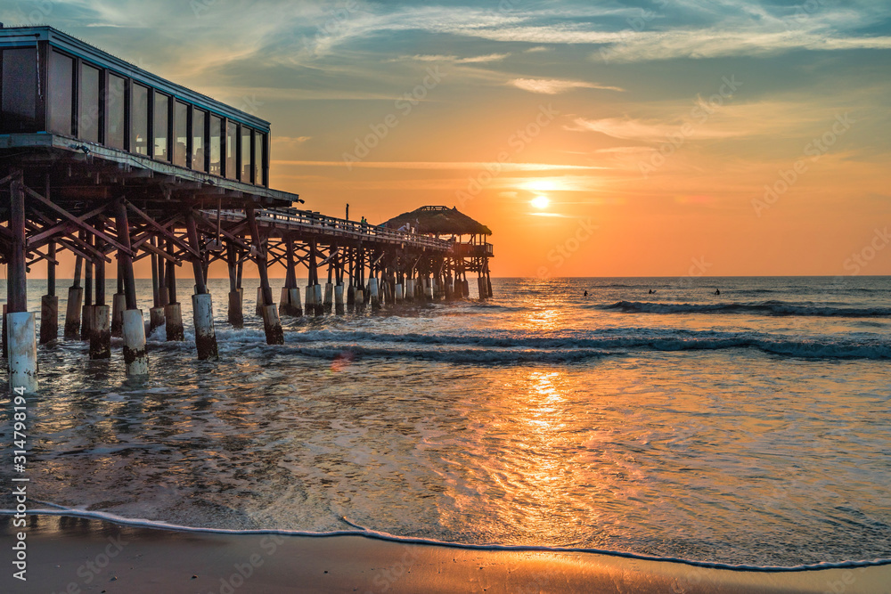 old wooden pier at sunrise in Florida