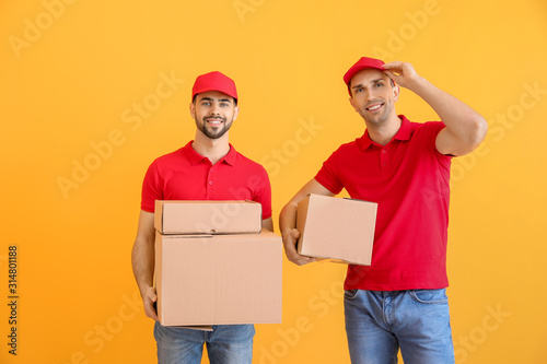 Delivery men with boxes on ...