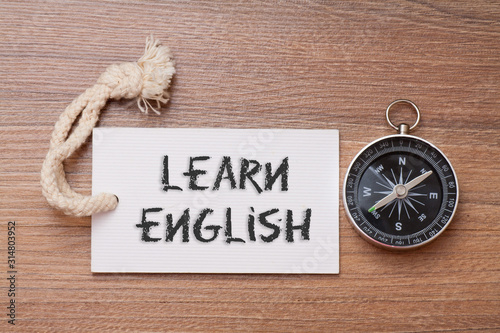 Learn English - Words handwriting on label with compass