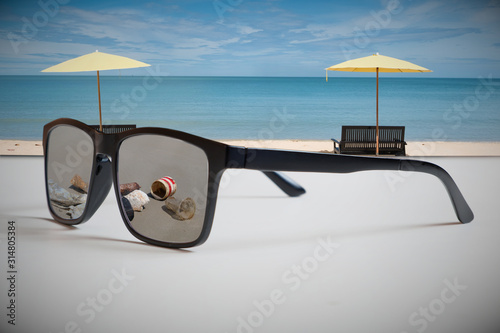 Abstract illustrations reflect the awareness of the marine environment. By reflecting images of garbage and toxins on the beach through glasses while looking at the beautiful beach and blue sea.