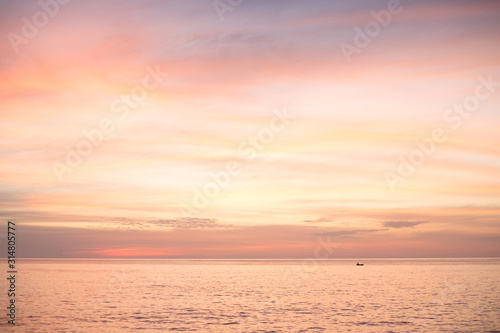 Sea pink sunset. Beautiful color clouds.