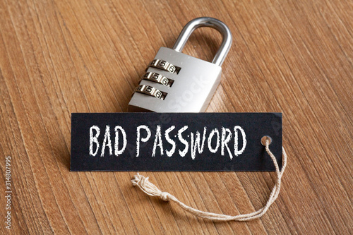 Bad Password words written on tag label with combination padlock photo