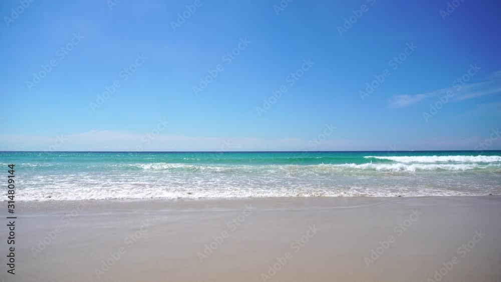 Beautiful tropical beach with blue sky and white cloud background. Summer vacation and nature environment concept. Beautiful tropical beach with blue sky and white cloud background. Summer vacation and nature environment concept.