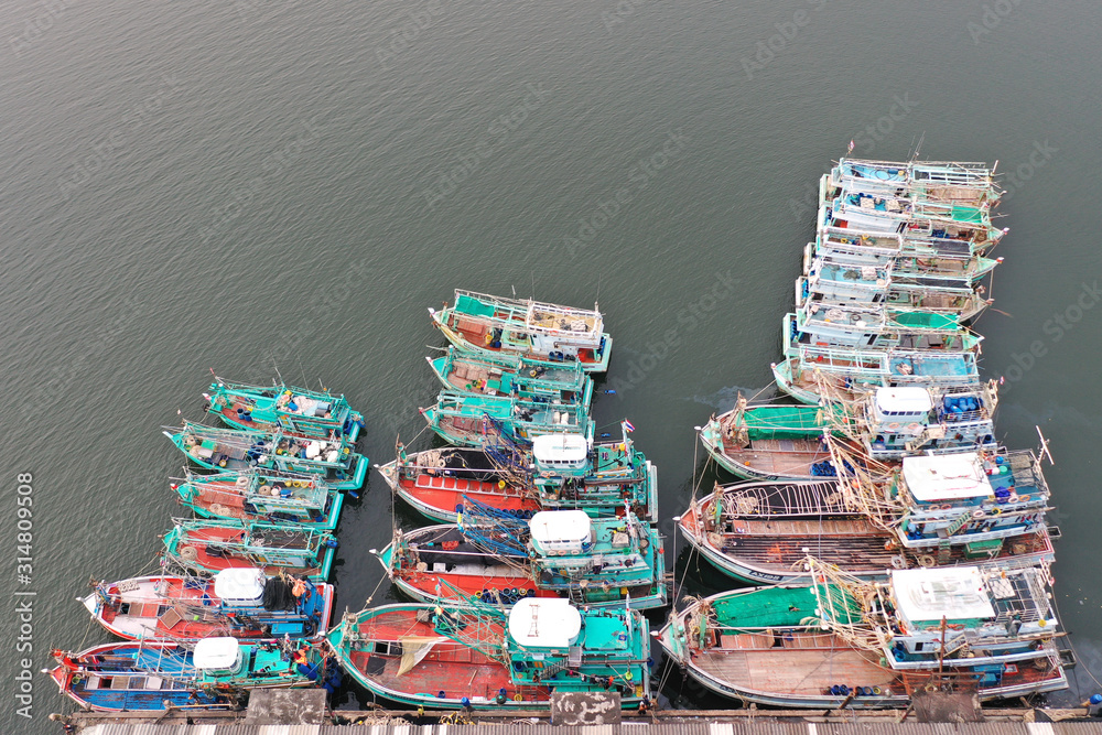 Fishing boats in port in Thailand. Overfishing is a big environmental problem. This shows how big the fleet is. Khura Buri, Andaman Sea