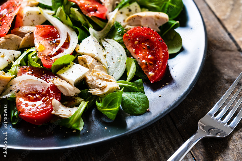 Tasty salad - vegetables , feta cheese and barbecue chicken fillet Tasty salad - vegetables , feta cheese and barbecue chicken fillet