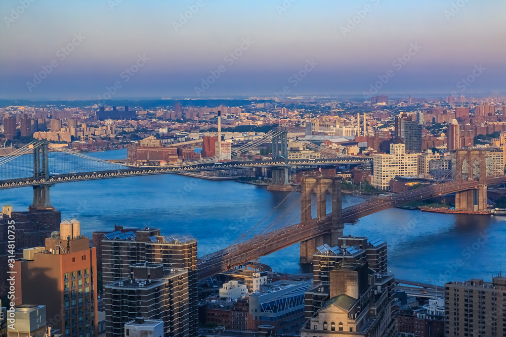 Aerial view from New York Downtown lower Manhattan on Brooklyn skyline over Brooklyn and Manhattan Bridges on East River