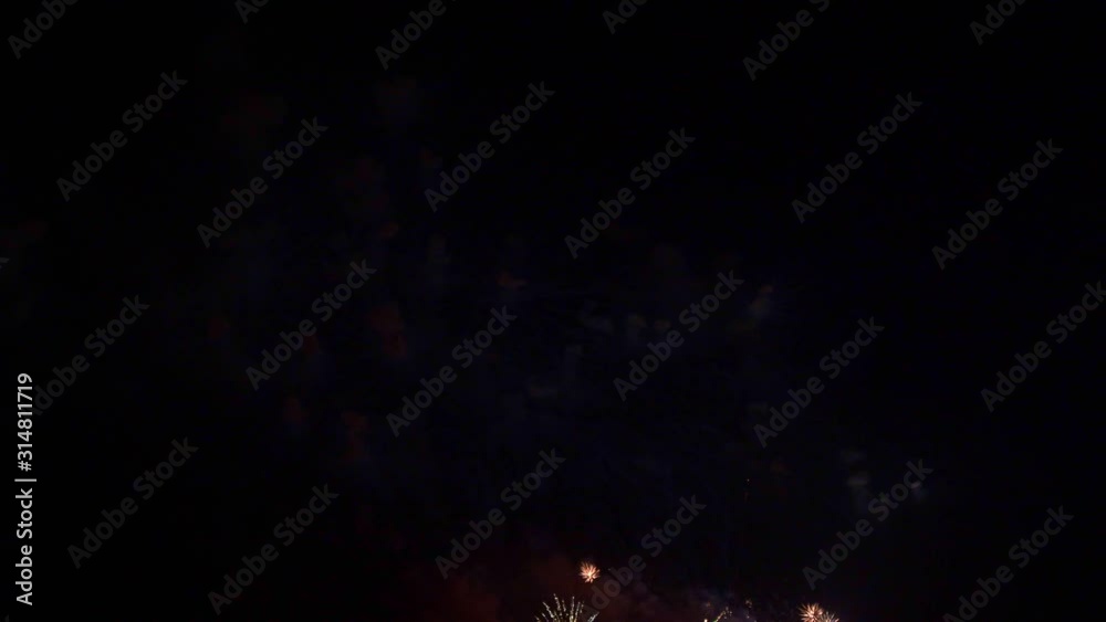 Beautiful abstract colourful Fireworks explode display on sky at night a symbol of celebration in New years anniversary for background
