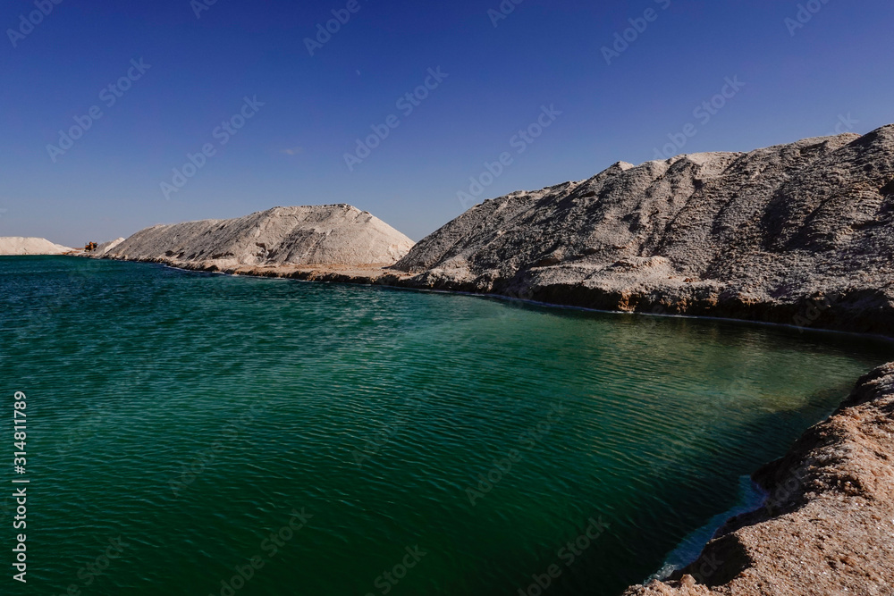 Fototapeta premium Siwa Oasis, Egypt The Siwa salt lakes which are used ot produce salt for export.