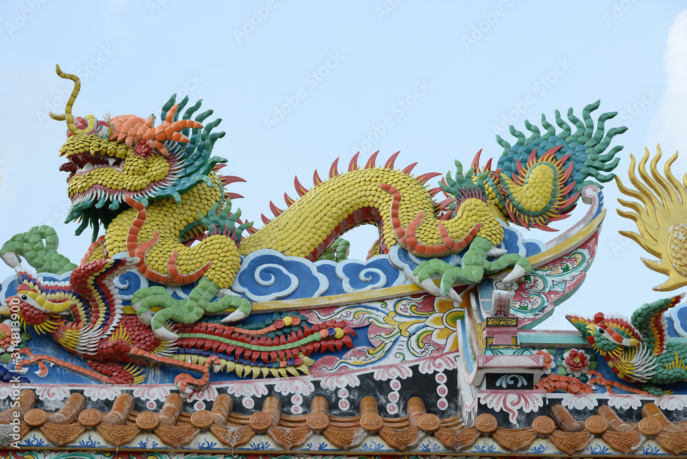 chinese dragon statue on the roof of temple chinese dragon statue on the roof of temple