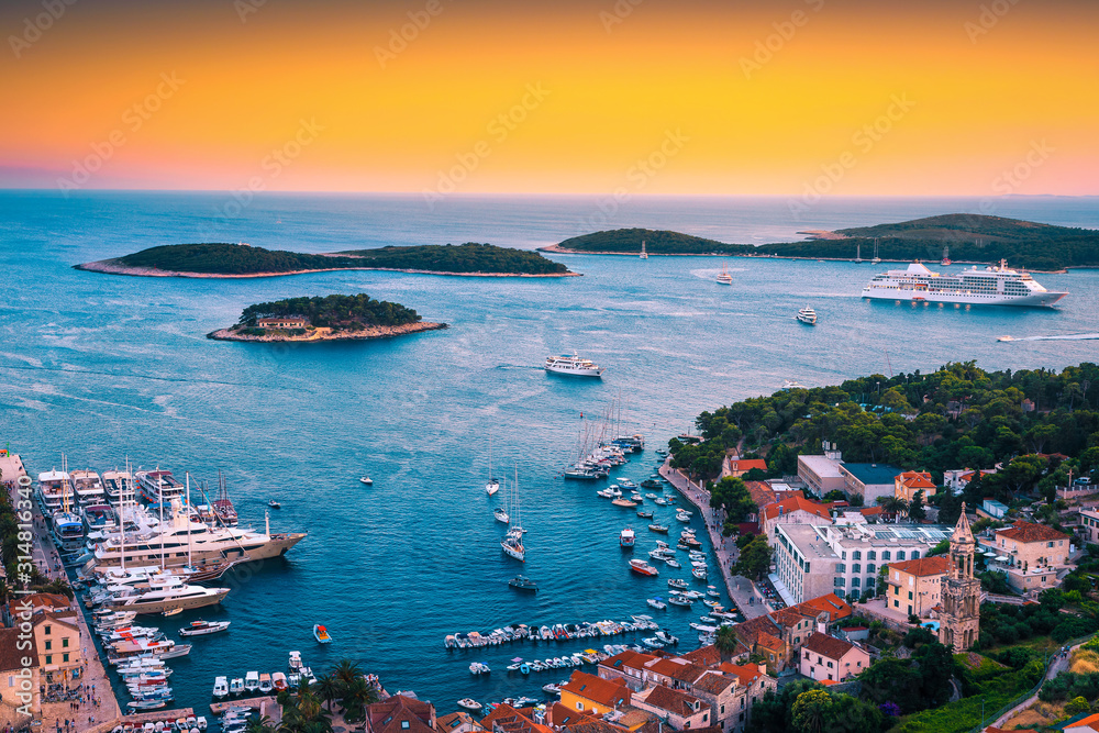 Gorgeous medieval Hvar town with fantastic harbor at sunset, Croatia