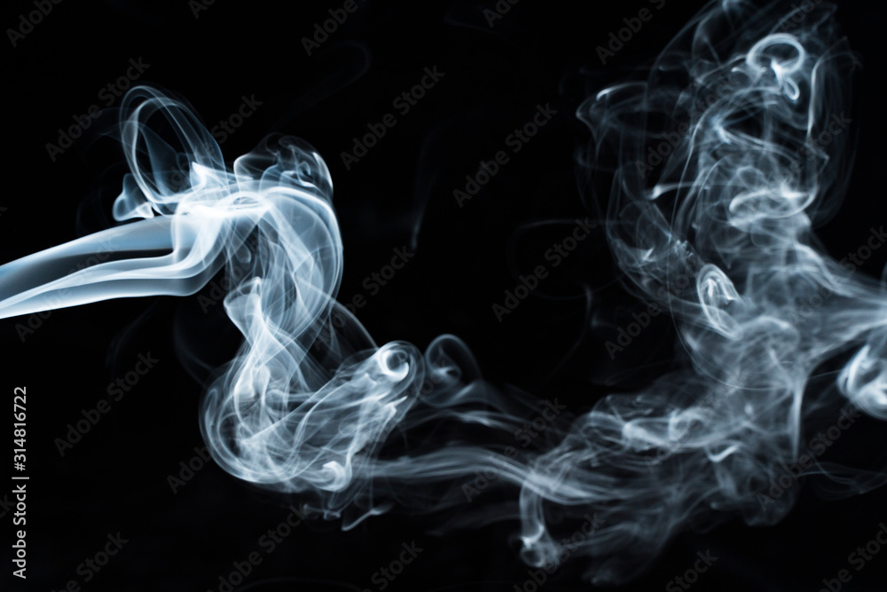 Naklejka premium Photo of a wisp of smoke on a dark background