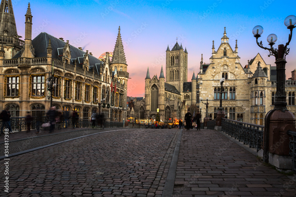 Old town of Ghent  in twilight, Belgium. Look from St. Michael bridge.  St. Nicholas church in the background.