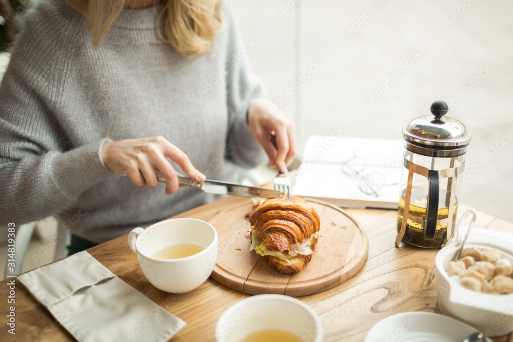 .breakfast girl, english breakfast with croissant
