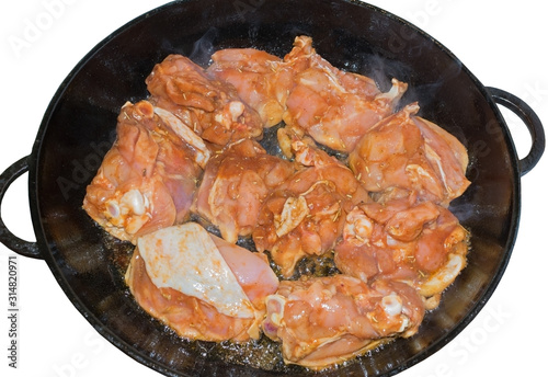 Pieces of Chicken marinated in a Pan