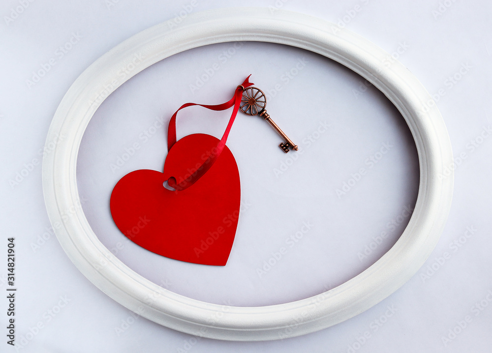 Red heart with a key in a white frame Red heart with a key in a white frame