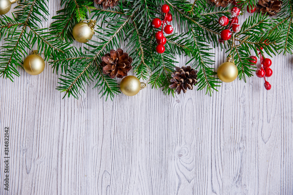 Christmas background with xmas tree and red berries on white wooden background. Merry christmas greeting card, frame, banner. Winter holiday theme. Happy New Year. Space for text. Christmas background with xmas tree and red berries on white wooden background. Merry christmas greeting card, frame, banner. Winter holiday theme. Happy New Year. Space for text.