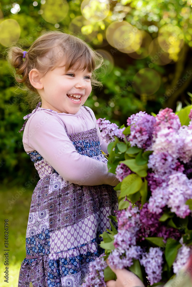 pretty little girl and her bouquet of garden flowers for her mom pretty little girl and her bouquet of garden flowers for her mom