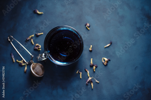 Pea tea, butterfly blue tea in glass mug, herbal detox drink. Anchan. Herbal hot or cold beverage