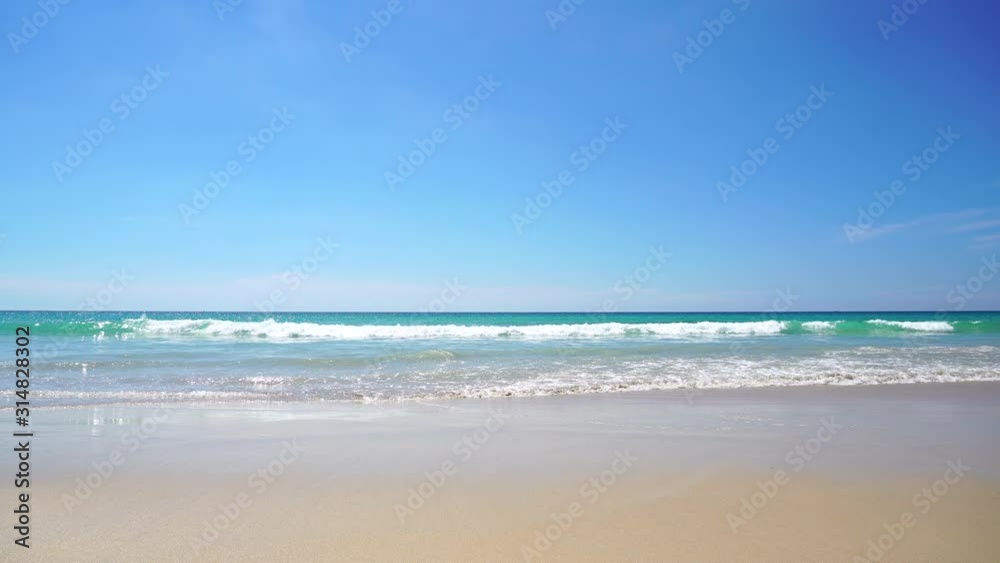Beautiful tropical beach with blue sky and white cloud background. Summer vacation and nature environment concept. Beautiful tropical beach with blue sky and white cloud background. Summer vacation and nature environment concept.