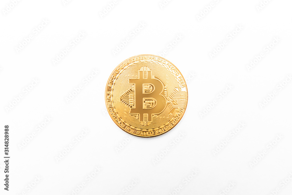 Bitcoin physical gold coin isolated on white Bitcoin physical gold coin isolated on white