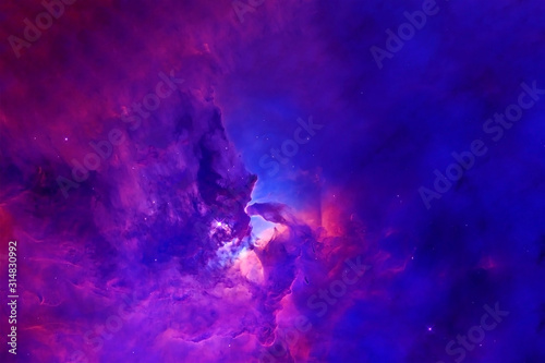 A beautiful pink-blue nebula in deep space. .Elements of this image were furnished by NASA.