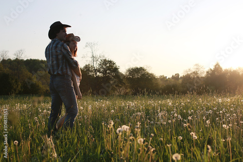 Cute couple on a walk by the countryside