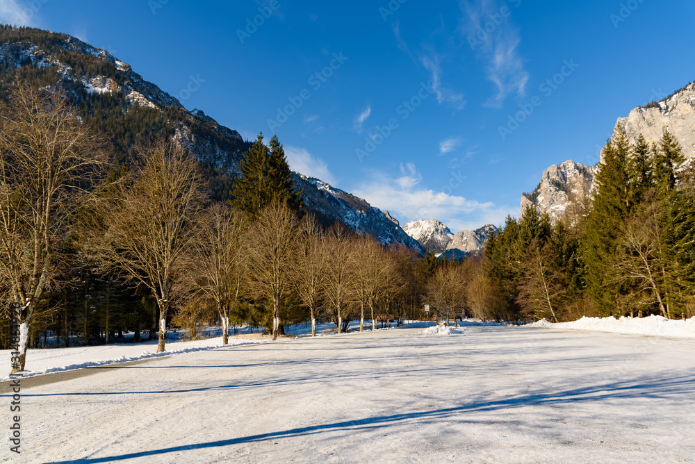 Obraz premium Peaceful mountain view of Hochschwab mountains Tragos, Oberort in Austria Styria. Tourist destination lake Gruner See in winter.