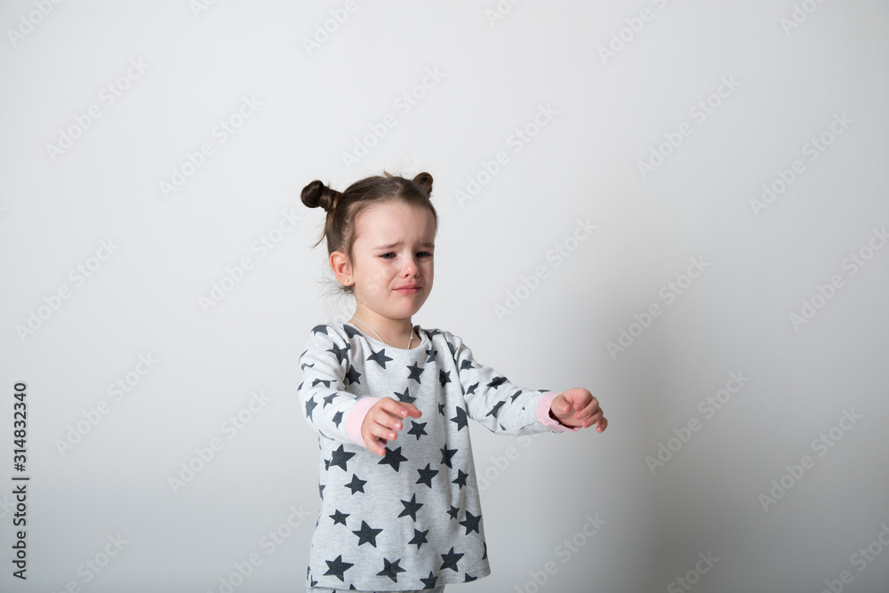 Crying little girl. Upset kid. Sad kid portrait. Cute little gilr crying and does not want to go in bed at night Crying little girl. Upset kid. Sad kid portrait. Cute little gilr crying and does not want to go in bed at night
