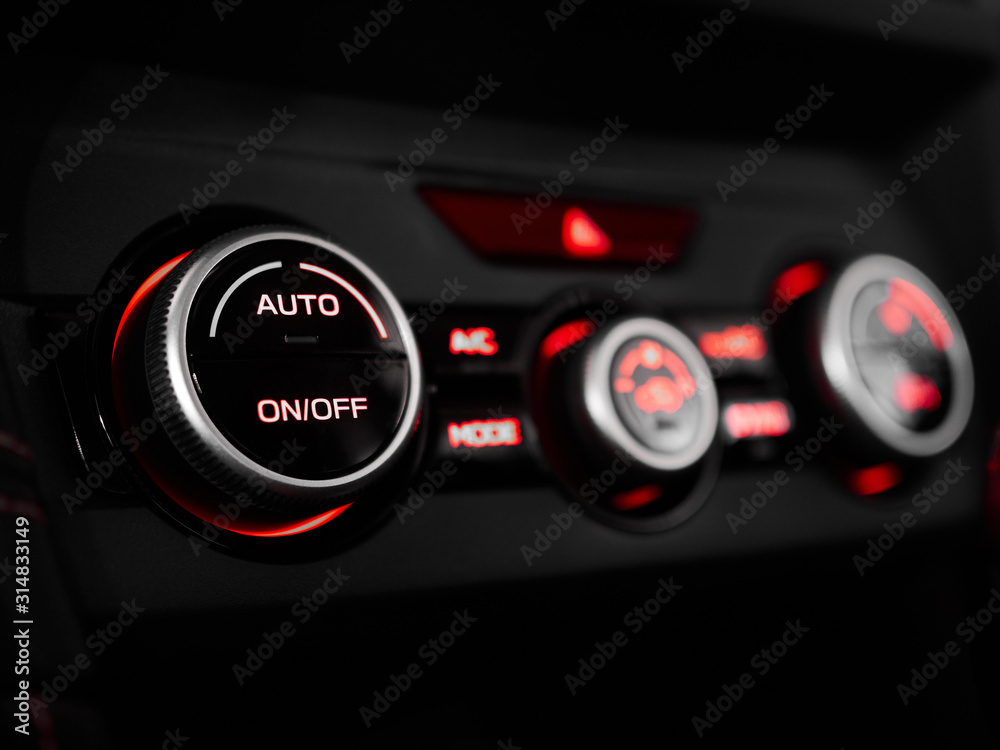 Close-up air conditioner Heater controls in interior modern car and salon equipment Close-up air conditioner Heater controls in interior modern car and salon equipment
