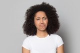 Upset unhappy african american millennial lady feeling depressed.