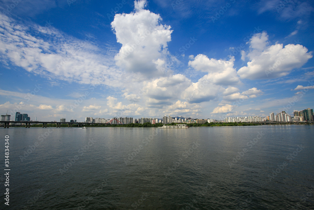 Seoul city and han river with blue sky white clouds in South Korea. Seoul city and han river with blue sky white clouds in South Korea.