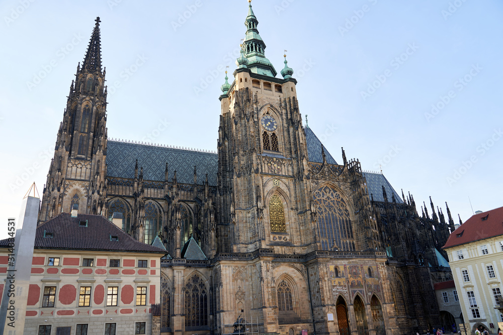 Front view of the main entrance to the St. Vitus cathedral in Prague Castle in Prague, Czech Republic. Photo of colorful European city of Prague daytime, month of may, travel in tourist place.