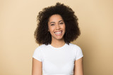 Head shot portrait happy smiling attractive african american young woman.