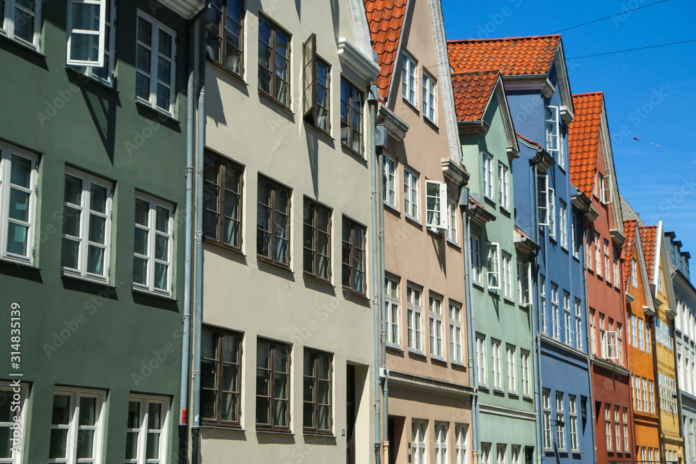 Several old historic houses in Copenhagen in Denmark and their colorful facades. Several old historic houses in Copenhagen in Denmark and their colorful facades.