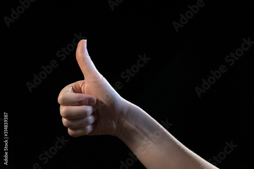 hand with thumb up isolated on white background