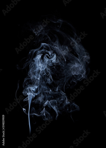 Fototapeta Naklejka Na Ścianę i Meble -  Photo of real white smoke on black background