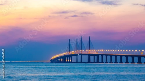 4K Time Lapse view of sunrise from Penang Bridge of George Town