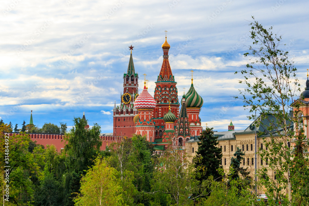 View of St. Basil's Cathedral and Spasskaya tower of Kremlin on Red Square in Moscow, Russia