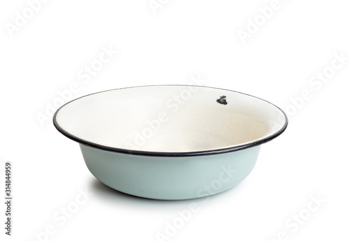 Bilde på lerret Old enamel dish, or bowl, isolated on white background