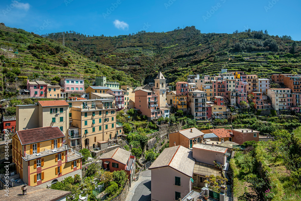 View at high land part of Manarola village with the ball tower in the center. Cinque Terre National parc in the Northwest of Italy.