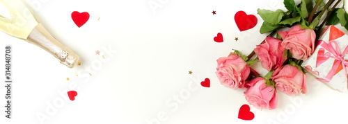 Valentine's day background banner. Bouquet of pink roses flowers, gift box an...