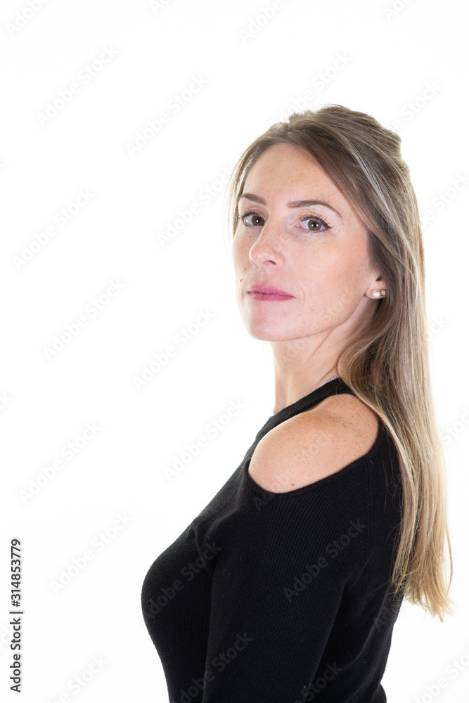 Close-up portrait of young woman blonde casual portrait in positive view beautiful model posing in studio over white background Close-up portrait of young woman blonde casual portrait in positive view beautiful model posing in studio over white background