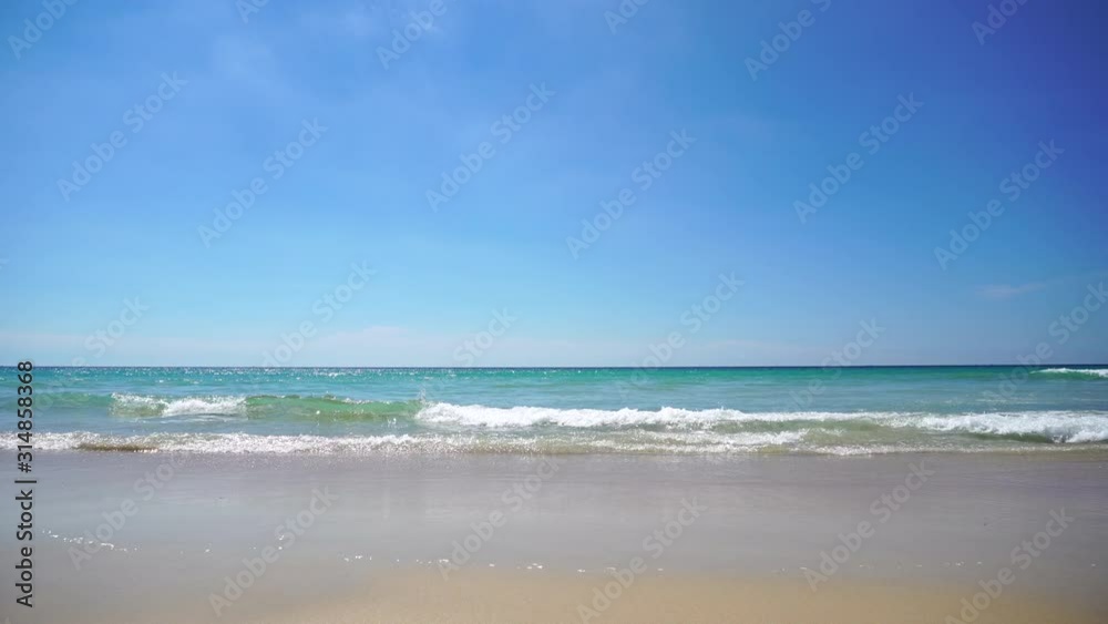 Beautiful tropical beach with blue sky and white cloud background. Summer vacation and nature environment concept. Beautiful tropical beach with blue sky and white cloud background. Summer vacation and nature environment concept.