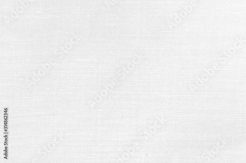 Close-up handmade natural cotton, linen old fabric textile cloth in light white vintage retro color for abstract background photo