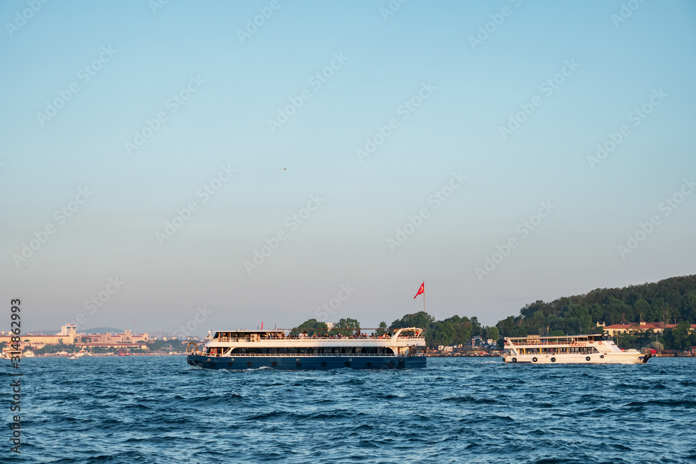 Obraz premium Beautiful view of passenger ships in the Bosphorus. Istanbul.