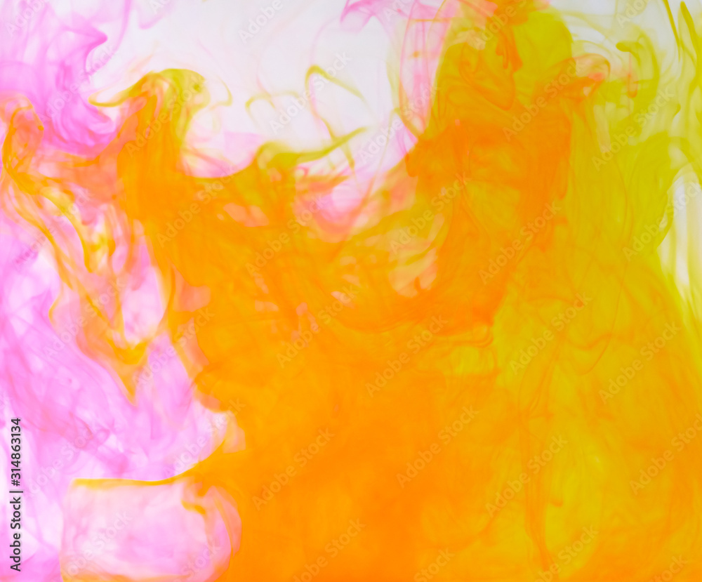 Blurred photo of food color drop and dissolve in water for background and texture concept. Blurred photo of food color drop and dissolve in water for background and texture concept.