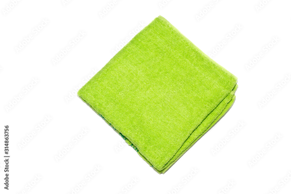The green towel on a white background The green towel on a white background